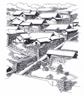 ・家の周りに積み上げた石垣で、台風に備える工夫をした愛媛外泊の民家。